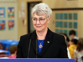 B.C. Finance Minister Katrine Conroy speaks to reporters during a photo-op at an elementary school a day before delivering the budget, Langford, B.C., February 27, 2023.