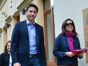Prime Minister Justin Trudeau and Canada's ambassador to Ukraine Larisa Galadza attend the reopening of the Canadian embassy in Kyiv, Ukraine on May 8, 2022.