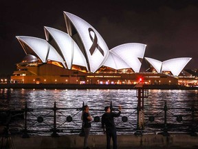 A black ribbon is illuminated on the Sydney Opera House on Feb. 9, 2023, in solidarity with Turkey and Syria after devastating earthquakes in the two countries killed more than 22,000.