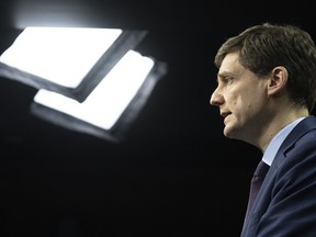 B.C. Premier David Eby speaks with media during a news conference on Parliament Hill, Wednesday, Feb. 1, 2023 in Ottawa. British Columbia Premier David Eby says he's feeling optimistic about next week's meetings with Prime Minister Justin Trudeau and the premiers about health care funding.