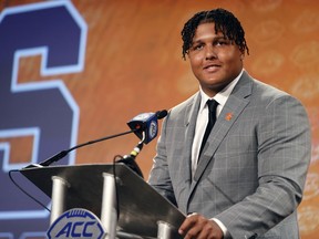 Syracuse offensive lineman Matthew Bergeron answers a question at the NCAA college football Atlantic Coast Conference Media Days in Charlotte, N.C., Wednesday, July 20, 2022.