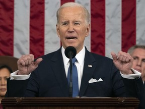 President Joe Biden delivers the State of the Union address to a joint session of Congress at the U.S. Capitol, Tuesday, Feb. 7, 2023, in Washington, as Vice President Kamala Harris and House Speaker Kevin McCarthy of Calif., listen.