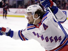 New York Rangers left wing Artemi Panarin (10) celebrates after his third goal of an NHL hockey game against the Carolina Hurricanes during the third period Saturday, Feb. 11, 2023, in Raleigh, N.C. Panarin, San Jose defenceman Erik Karlsson and Arizona right-wing Clayton Keller have been named the NHL's three stars of the week.THE CANADIAN PRESS/AP-Chris Seward