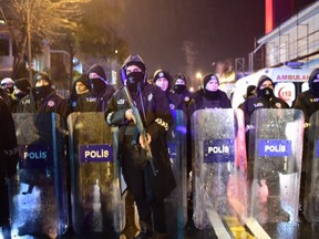 Turkish anti-riot police officers stand guard at the site of an armed attack January 1, 2017 in Istanbul.