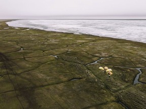 This Sunday, June 30, 2019, aerial photo released by Earthjustice shows the Alaska's North Slope in the Western Arctic on the edge of Teshekpuk Lake, Alaska. The Biden administration issued a long-awaited study on Wednesday, Feb. 1, 2023, that recommends allowing a major oil development on Alaska's North Slope, and the move -- while not final -- drew immediate anger from environmentalists who saw it as a betrayal of the president's pledges to reduce carbon emissions and promote clean energy sources.