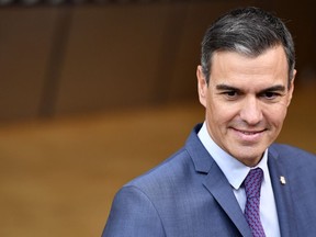 FILE - Spain's Prime Minister Pedro Sanchez arrives for an EU summit in Brussels, on Oct. 20, 2022. Sanchez travels to Rabat on Wednesday along with 12 ministers for a two-day meet with Moroccan government officials, as part of the European country's strategy to improve historically complex relations with its neighbor across the Strait of Gibraltar.