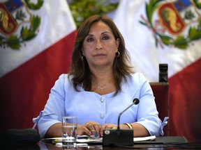 Peruvian President Dina Boluarte gives a press conference at the government palace in Lima, Peru, Friday, Feb. 10, 2023. Peru is in the midst of a political crisis as protestors are seeking Boluarte's resignation and the dissolution of Congress, after former President Pedro Castillo was ousted and arrested for trying to dissolve Congress in December.