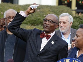 FILE - The Rev. T. Anthony Spearman, then-president of the North Carolina NAACP, crumples up a mailer which tells voters that IDs are needed in the upcoming 2020 election during a news conference outside the Legislative Building in Raleigh, N.C., on Dec. 27, 2019. The civil rights advocate and former president of the North Carolina branch of the NAACP died by suicide after being found in his Greensboro home with a self-inflicted gunshot wound last summer, according to an autopsy released Tuesday, Feb. 14, 2023.