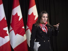 Minister of Finance and Deputy Prime Minister Chrystia Freeland speaks to the media at the Hamilton Convention Centre, in Hamilton, Ont., during the second day of meetings at the Liberal Cabinet retreat, on Tuesday, January 24, 2023.