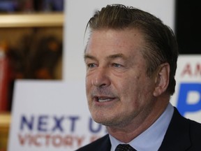 FILE - Actor Alec Baldwin, speaks to supporters of Amanda Pohl, candidate for Virginia Senate District 11 in her home in Midlothian, Va., Tuesday, Oct. 22, 2019. Prosecutors announced Thursday, Jan. 19, 2023 they are charging Baldwin with involuntary manslaughter in fatal shooting of cinematographer on movie set.