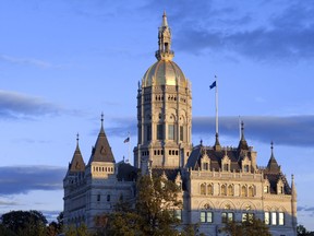 FILE - The Connecticut State Capitol building is seen in Hartford, Conn., on Oct. 1, 2012. A group of Hispanic lawmakers in Connecticut proposed Wednesday, Feb. 1, 2023, that the state follow Arkansas' lead and ban the term "Latinx" from official government documents, calling it offensive to Spanish speakers.