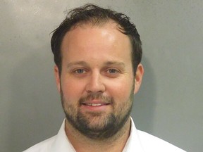 FILE - This undated photo provided by Washington County, Ark., Detention Center shows Josh Duggar. An attorney for Duggar asked a federal appeals court panel on Thursday, Feb. 16, 2023, to reverse the former reality TV star's conviction for downloading child pornography, saying investigators violated his rights by seizing the phone he was using to try to call his lawyer during the search that found the images. (Washington County Detention Center via AP, File)