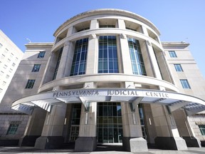 FILE - The exterior of the Pennsylvania Judicial Center, home to the Commonwealth Court in Harrisburg, Pa., is pictured on Nov. 6, 2020. A Pennsylvania judge ruled Tuesday, Feb. 7, 2023, that the state's funding of public education falls woefully short, siding with poorer districts in a lawsuit that was first filed eight years ago.