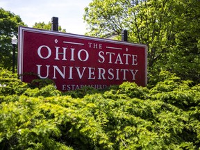 FILE - A sign for Ohio State University stands in Columbus, Ohio, May 8, 2019. Ohio State University announced plans Thursday, Feb. 16, 2023, to use a $110 million donation from IT innovator and executive Ratmir Timashev's family foundation to establish a software innovation center with the goal of becoming a new hub for innovation, entrepreneurship and product development.