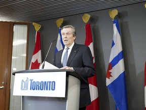 Toronto Mayor John Tory speaks during a news conference at City Hall in Toronto on Friday, Feb. 10, 2023.