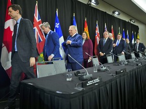 Canada's premiers leave a news conference regarding health care, in Ottawa on February 7, 2023.