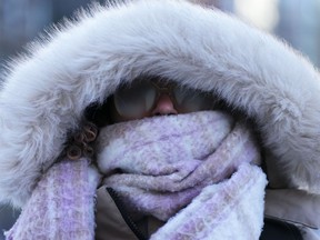Environment Canada is warning of wind chill values between -30 C and -40 C across much of southern and eastern Ontario throughout Friday morning, which could cause frostbite to quickly develop on exposed skin. A person makes their way through frigid temperatures in downtown Ottawa on Friday, Feb. 3, 2023, as a cold snap hits eastern Ontario.