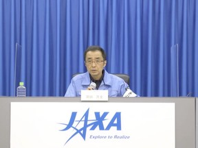 In this image made from video, JAXA mission manager Masashi Okada speaks during an online news conference in Tanegashima, southwestern Japan, Friday, Feb. 17, 2023. Japan's space agency said the launch of the first of its new flagship series H3 rockets was aborted on Friday due to failure to ignite auxiliary booster engines for the rocket carrying an observation satellite also fitted with an experimental infrared sensor that could detect missile launches.(JAXA via AP)