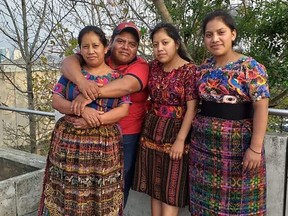 Norma Macario (L-R) with her husband, Ottoniel Lares Batzibal, and daughters, Rumalda Maricela Lares Macario and María Teresa Lares Macario, are seen in 2019 in this photo provided Feb. 23, 2023. The family of a Guatemalan farm worker who accidentally died in July 2021 says it is "disappointed" with the decision of Quebec's labour tribunal, which refused to compensate the family because the death was not deemed a work accident.