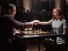 THE QUEEN'S GAMBIT (L to R) MARCIN DOROCINSKI as VASILY BORGOV and ANYA TAYLOR-JOY as BETH HARMON in episode 107 of THE QUEEN'S GAMBIT.