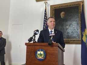 Vermont Republican Gov. Phil Scott, right, faces reporters at the Statehouse, in Montpelier, Vt., Tuesday Feb. 7, 2023, as he calls for a return to civility. Speaking in the aftermath of a Jan. 31 brawl at a middle school basketball game that ended with the death of one of the participants, Scott said there is too much anger in contemporary society. He said "all of us have an obligation to tone down the rhetoric and recognize the humanity in everyone."