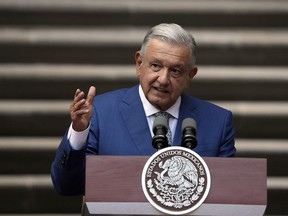 FILE - Mexican President Andres Manuel Lopez Obrador speaks during the North America Summit, at the National Palace in Mexico City, Jan. 10, 2023. Obrador said on Feb. 23, 2023 that he'll sign a new bill into law that will cut funding to the country's electoral agency.