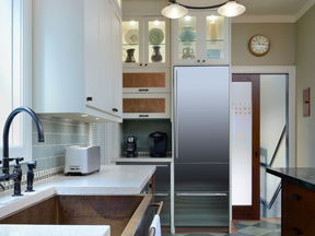 Natural materials in the kitchen include soapstone counters, a hammered copper sink and cherrywood cabinetry.