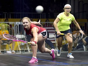 Hollie Naughton, left, of Canada, and Olivia Blatchford, of USA, compete in the women's team squash gold medal final at the 2015 Pan Am Games in Toronto on Friday, July 17, 2015.