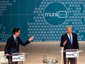 Liberal Leader Justin Trudeau, left, and Conservative Leader Stephen Harper trade words a debate in Toronto in 2015. "The great niqab debate of 2015 wasn’t just about facial coverings — or even the place of Muslims in Canada. It was, more foundationally, a proxy battle pitting two visions of Canadian identity," writes Rahim Mohamed.