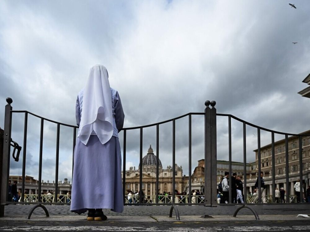 A nun stands at St. Peter’s square on March 30, 2023 in The Vatican, a day after the Pope was admitted to the Gemelli hospital in Rome.