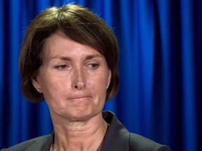 B.C. Representative for Children and Youth Mary Ellen Turpel-Lafond listens during a news conference after releasing a joint report with the B.C. Information and Privacy Commissioner about cyberbullying, in Vancouver, B.C., on Friday November 13, 2015. Another award has been stripped from Turpel-Lafond, the former judge, law professor and British Columbia representative for children and youth whose claims of Indigenous ancestry have been discredited.