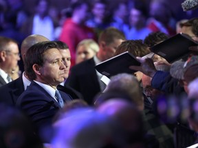 Florida Gov. Ron DeSantis signs copies of his book after speaking to Iowa voters during an event at the Iowa State Fairgrounds on March 10, 2023 in Des Moines, Iowa. DeSantis, who is widely expected to seek the 2024 Republican nomination for president, is one of several Republican leaders visiting the state this month.   (Photo by Scott Olson/Getty Images)