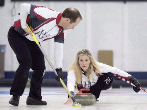 Brent Laing sweeps for teammate Jennifer Jones in the Wall Grain Mixed Doubles Curling Classic at the Oshawa Curling Club in Oshawa, Ont. on Monday, November 16, 2015. Canadian curlers Jennifer Jones and Brent Laing are off to a winning start to the season. The husband-and-wife team downed Scotland's Jayne Stirling and Fraser Kingan 9-5 in the mixed doubles final of the Audi quattro Winter Games NZ on Thursday.THE CANADIAN PRESS/Frank Gunn
