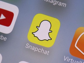 The Snapchat app appears on a mobile device in New York, Wednesday, Aug. 9, 2017.