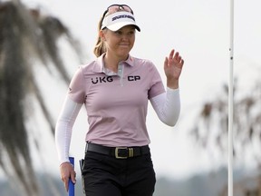 Brooke Henderson waves to the gallery after sinking a birdie putt on the 18th green during the first round of the LPGA Hilton Grand Vacations Tournament of Champions Thursday, Jan. 19, 2023, in Orlando, Fla. Canada's Brooke Henderson is in one of the featured groups at the LPGA's Drive On Championship.THE CANADIAN PRESS/AP, John Raoux