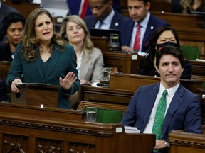 Canada's Prime Minister Justin Trudeau looks on as Canada's Deputy Prime Minister and Minister of Finance Chrystia Freeland presents the federal government budget for fiscal year 2023-24 in the House of Commons on Parliament Hill in Ottawa, Ontario, Canada March 28, 2023.  REUTERS/Blair Gable