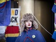 A Norwegian Sami protester poses in traditional clothes. Climate activist Greta Thunberg and dozens of indigenous Sami activists expanded a protest on against contested wind turbines in Norway by blocking entrances to several government ministries. (Photo by Olivier MORIN / AFP)