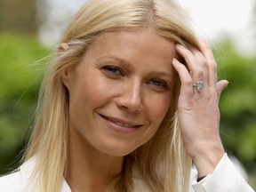 Gwyneth Paltrow poses for a photograph on the B&Q stand at the launch of a new nepenthes cultivar nepenthes named 'Helen' during Chelsea Flower Show Press and VIP Day on May 23, 2011 in London, England.