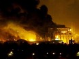 An explosion rocks Baghdad during air strikes on Iraq, March 21, 2003.