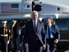 U.S. President Joe Biden boards Air Force One on March 9, 2023.