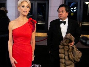 White House Counselor Kellyanne Conway and her husband George Conway arrive for a candlelight dinner at Union Station on the eve of the 58th presidential inauguration in Washington, U.S., January 19, 2017.