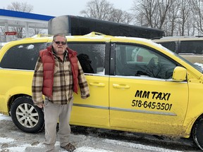 Taxi driver Tom is one of a dozen Plattsburgh, N.Y., cab drivers who wait for migrants arriving from New York City at the Greyhound bus terminal to then drive them to Roxham Road, where they will cross the border illegally and make an asylum claim in Canada.