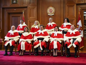 The Supreme Court of Canada justices. Justice Russell Brown is at the left end of the front row.