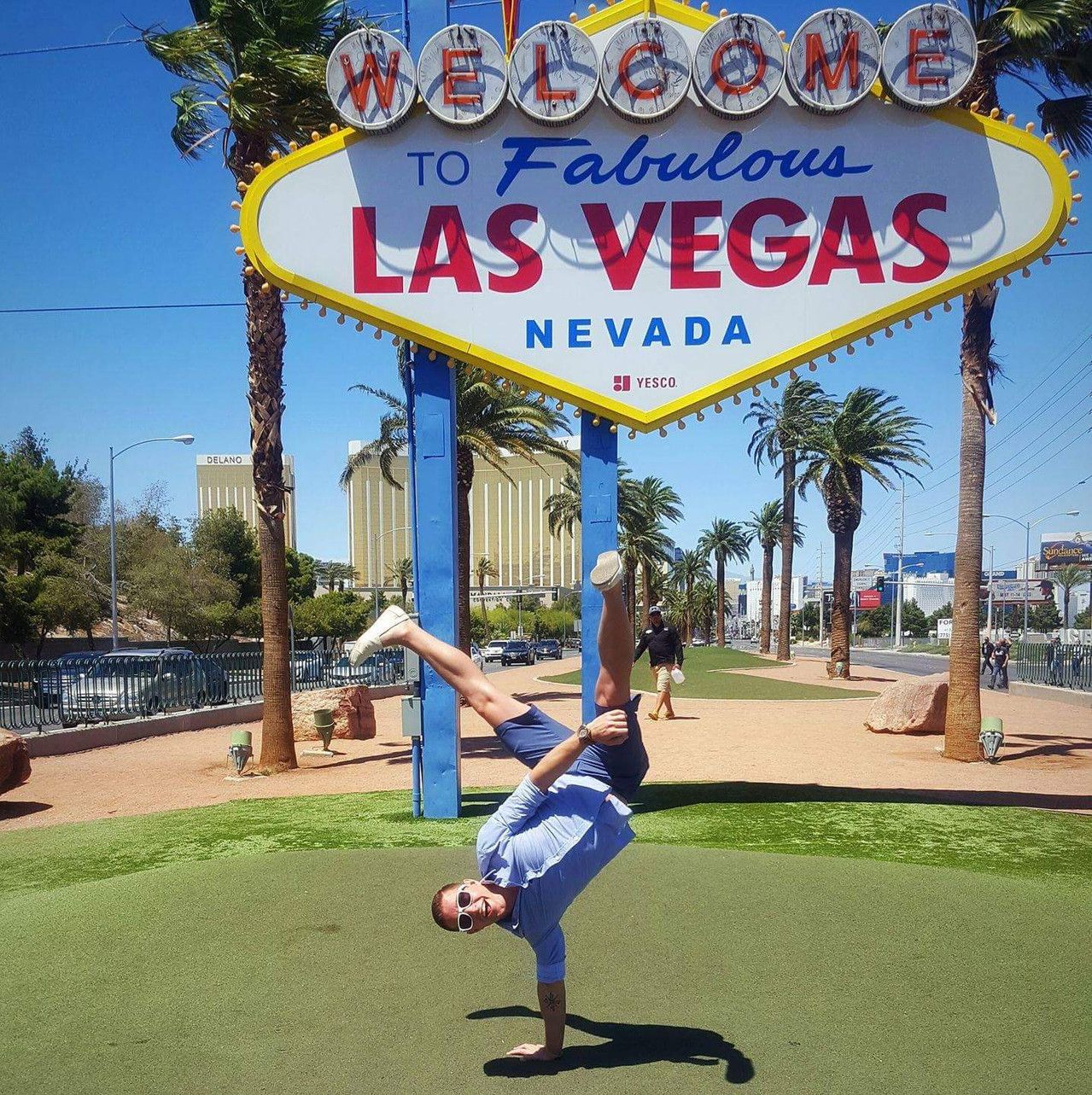 Toby Stanley in front of the famous Las Vegas sign.
