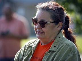 Victoria McIntosh, residential school survivor, speaks to reporters before attending the opening day of retired Catholic priest Arthur Masse, in Powerview-Pine Falls, Man., on July 20, 2022.