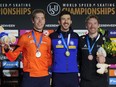 Davide Ghiotto of Italy, center and gold medal, Jorrit Bergsma of the Netherlands, left and silver medal, Ted-Jan Bloemen of Canada, right and bronze medal, celebrate on the podium of the 10,000m Men event of the Speedskating Single Distance World Championships at Thialf ice arena Heerenveen, Netherlands, Sunday, March 5, 2023. Skating in the second of six pairs, Bloemen posted a time of 13 minutes, 1.84 seconds in the 25-lap race.