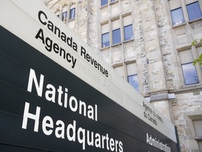 A sign outside the Canada Revenue Agency is seen Monday May 10, 2021 in Ottawa.&ampnbsp;The federal taxpayers' ombudsperson is recommending better unconscious bias training for employees of the Canada Revenue Agency's charities directorate.
