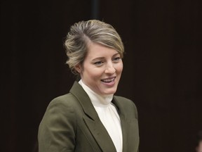 Foreign Affairs Minister Melanie Joly waits to appear before the Standing Committee on Citizenship and Immigration in Ottawa on Wednesday March 22, 2023.