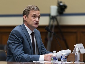 FILE - Author Patrick Radden Keefe testifies before a House Oversight Committee hearing on legislation inspired by the bankruptcy case of Purdue Pharma and the members of the wealthy Sackler family that own it, on Capitol Hill, Tuesday, June 8, 2021, in Washington. The Baillie Gifford Prize is marking its 25th year with a Winner of Winners prize. Three American writers, two from Canada and one from Britain are on the shortlist announced Thursday, March 9, 2023 for the 25,000 pound ($30,000) trophy.