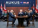 U.S. President Joe Biden, centre, participates in a trilateral meeting with British Prime Minister Rishi Sunak, right, and Australia's Prime Minister Anthony Albanese, left, during the AUKUS summit on March 13, 2023, at Naval Base Point Loma in San Diego.